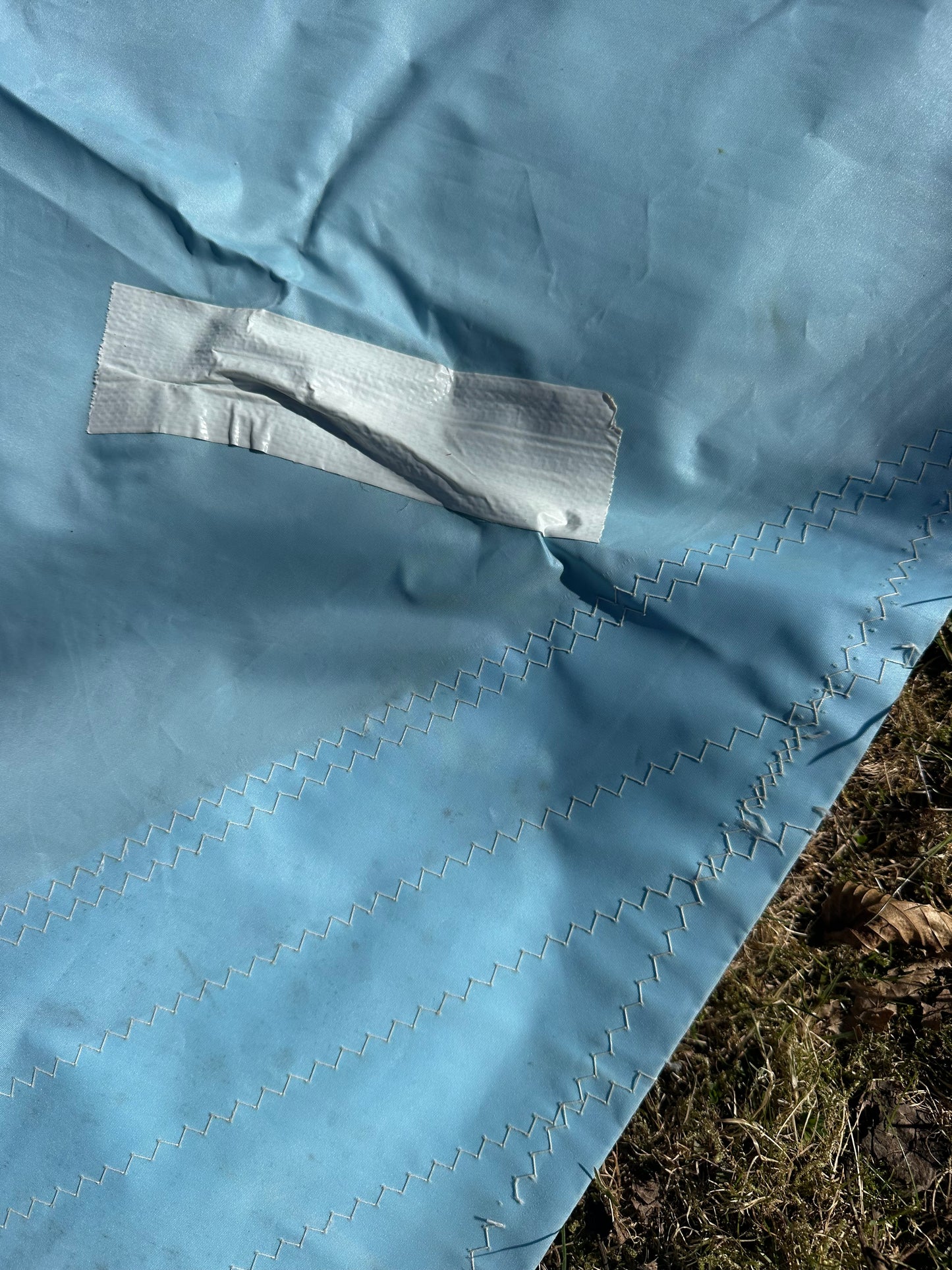 Hobie 18 segel - begagnat (blått-vitt-gult)